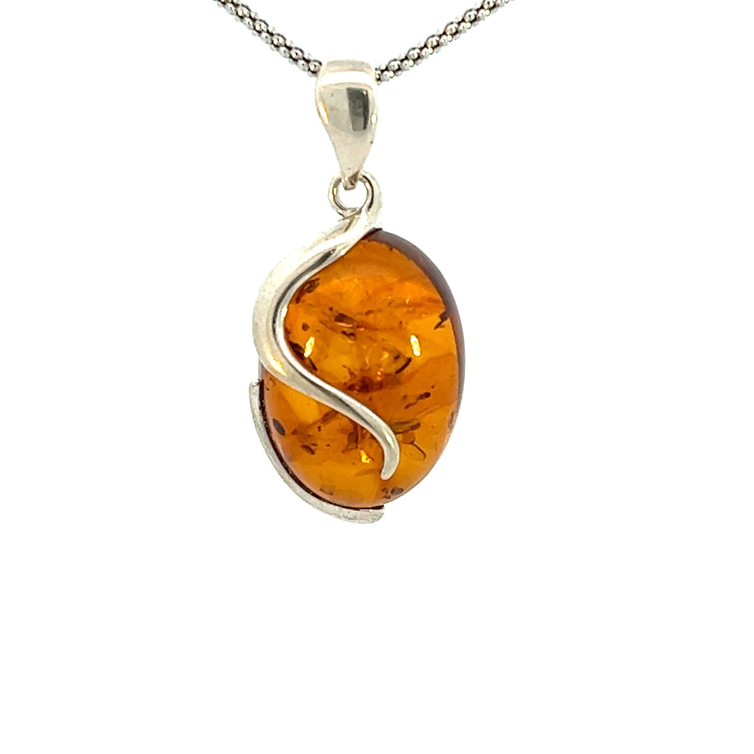 Oval Amber Pendant with a Twist