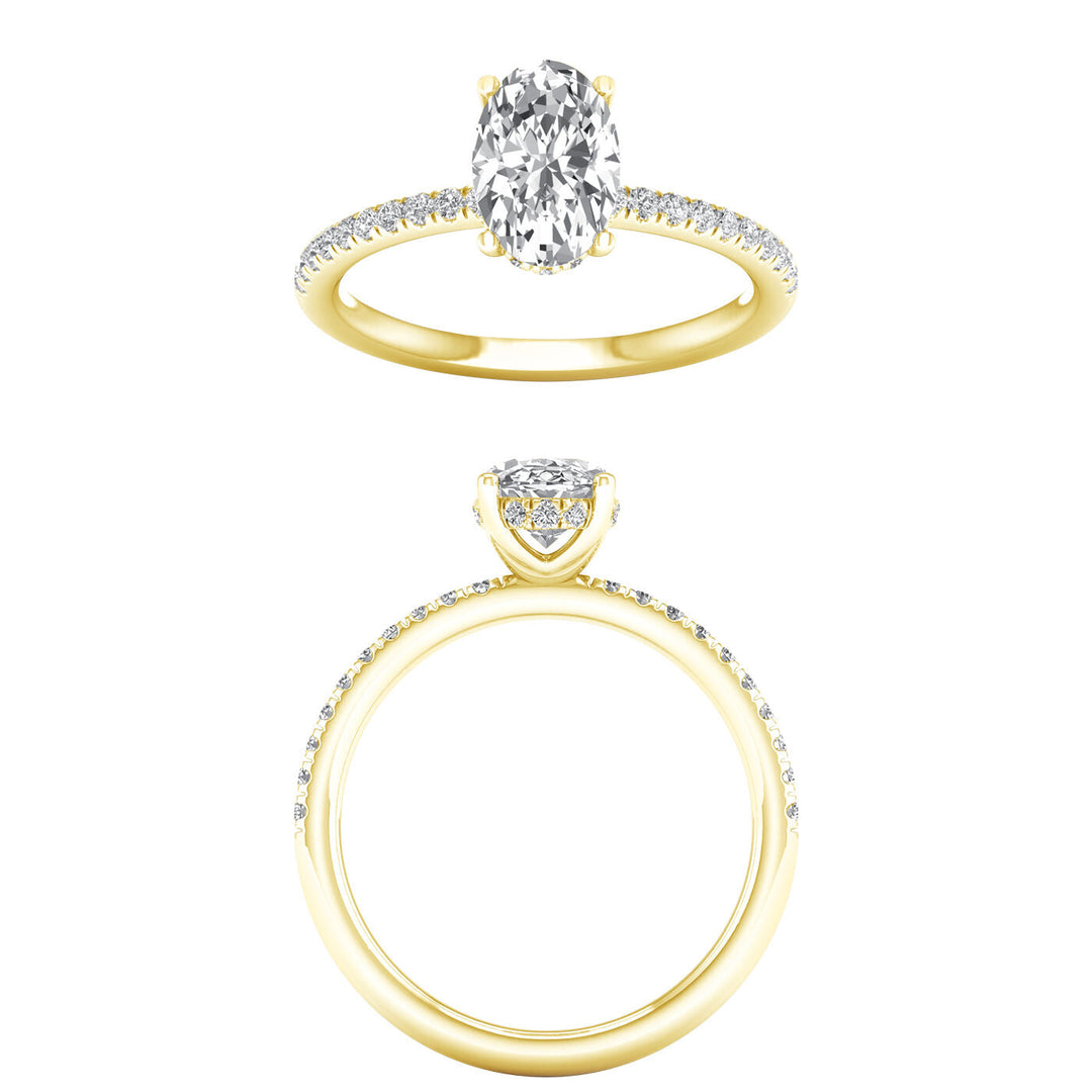 Side view of a brilliant oval diamond ring showing the secret hidden halo at Silvadi Jewelry in Aurora, CO.