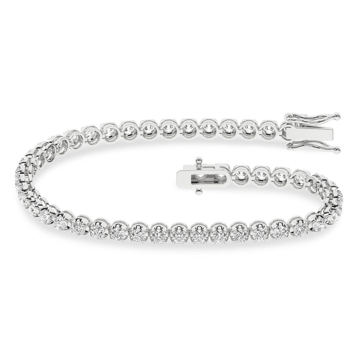 Detailed view of Crown Prong Bezel Style Setting on 14KT Gold Diamond Bracelet