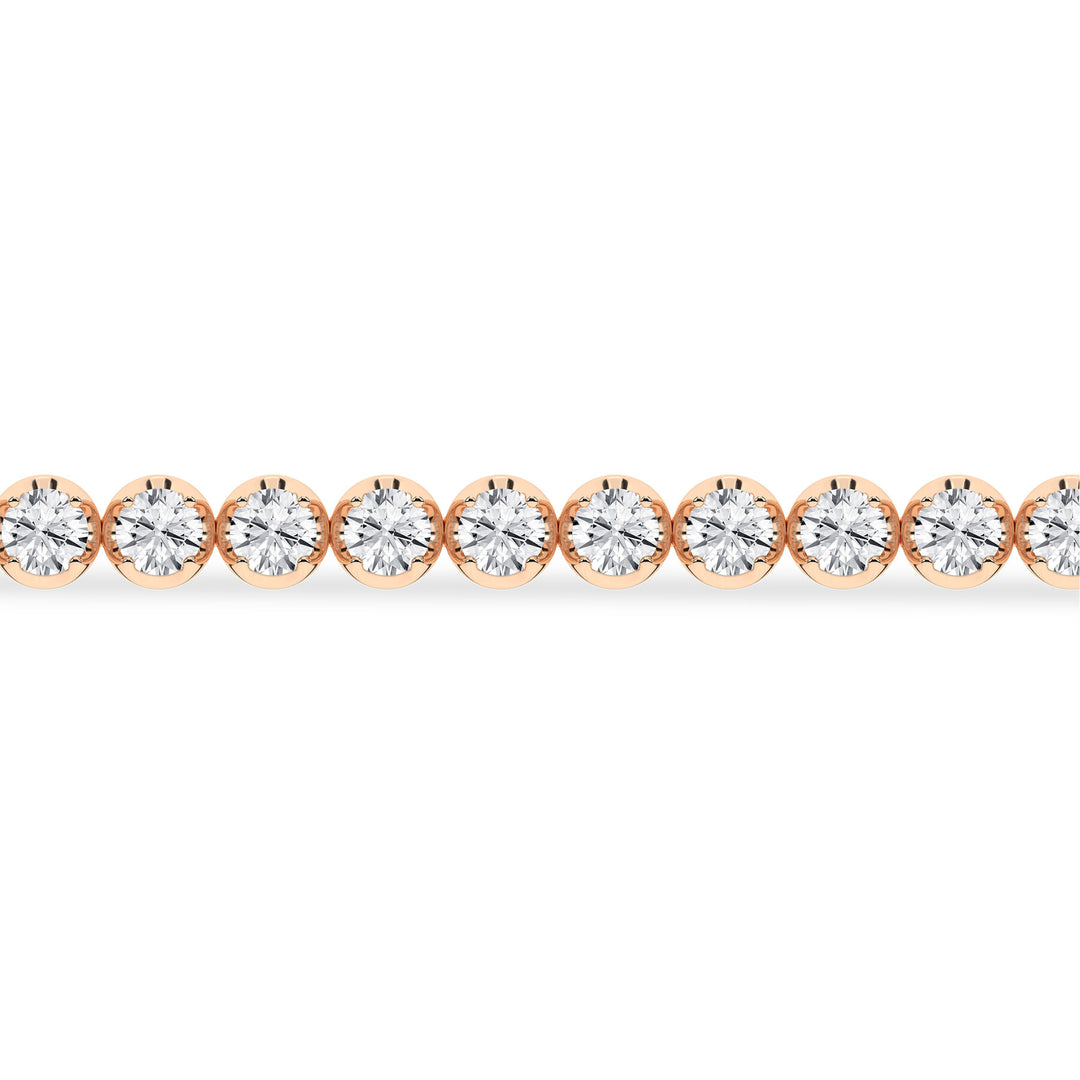 Woman wearing a 5ctw EF Color Lab Diamond Tennis Bracelet in Aurora CO showroom