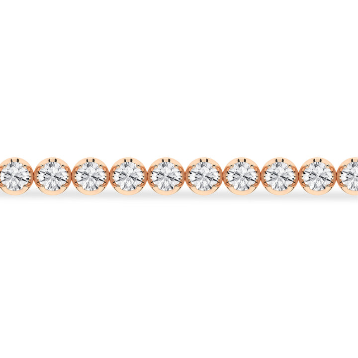 Woman wearing a 5ctw EF Color Lab Diamond Tennis Bracelet in Aurora CO showroom